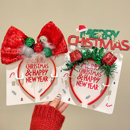 HKM-185491 Christmas-Themed Hairband with Decorations like Antlers, Santa Claus, and Colorful Bow for Holiday Fun