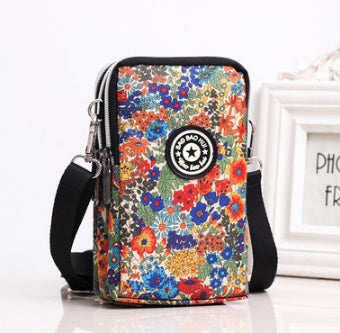HKM-470931 Vertical Oxford Phone Bag with Zipper Closure and Multiple Floral Prints