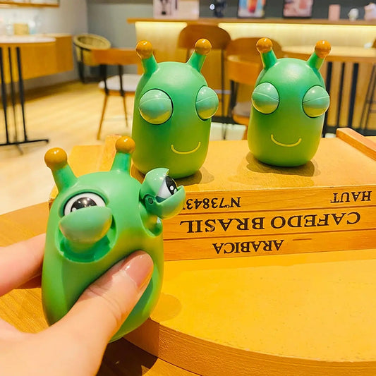 HKM-494419 Green Eye Bouncing Worm Squeeze Toy for Kids - Fun Novelty Gift for Ages 2 and Up