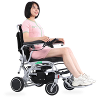 HKM-3240403 Light Folding Electric Wheelchair Dual 250W Hub Motors 24V 24Ah Battery 12.4 Mile Range 265 lb Capacity Aluminum