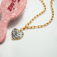 HKM-0778557 Leopard-Print Heart-Shaped Stainless Steel Necklace with Oil-Drip Finish