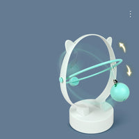 HKM-1107389 Perpetual Rocking Cat Toy with Hair Ball and Electric Magnetic Movement - Available in Blue, Pink, Green