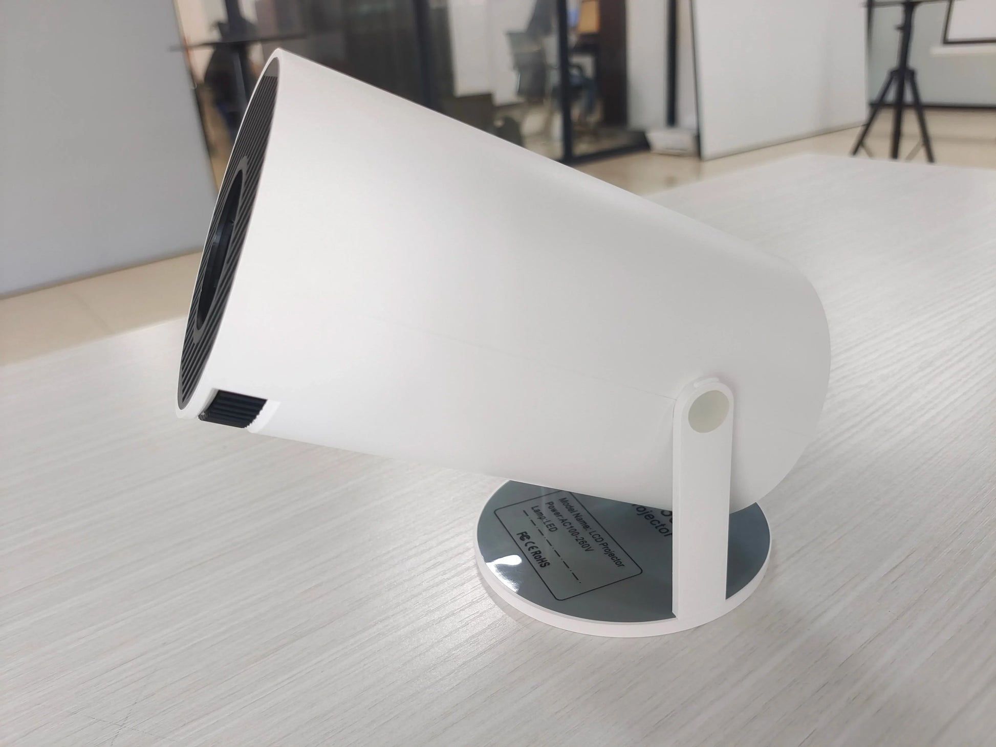 HKM-122323 Portable Mini Projector with 720p Resolution, Android 11, and Wi-Fi for Streaming Movies and Videos
