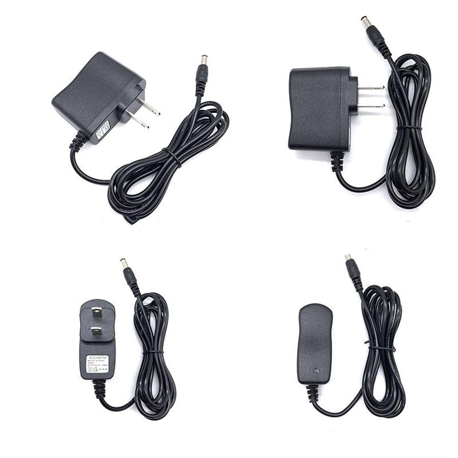 HKM-255251 Universal AC/DC Power Supply Adapter for US, European, British, and Australian Plugs - Perfect for HUBs, Stage Lights, and LED Strips