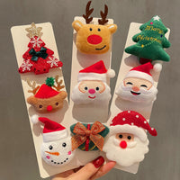 HKM-259411 Christmas Cartoon Character Brooch Decoration with Snowflake Design