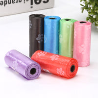 HKM-2863805 Pet Waste Garbage Bags with Footprint Design - 15 Count Roll, Random Colors, Flat Mouth, Made from PP