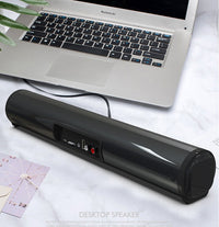HKM-297491 Cylindrical Portable Bluetooth Speaker with Radio Function and 8 Hours Playtime