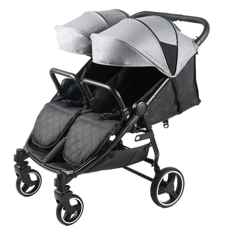 HKM-4142419 side-by-side twin stroller angled view with gray footmuffs