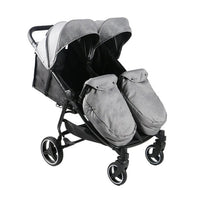 HKM-4142419 side-by-side twin stroller front view with black footmuffs