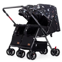 HKM-4175187 side-by-side twin stroller angled view in galaxy print
