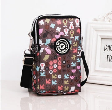 HKM-470931 Vertical Oxford Phone Bag with Zipper Closure and Multiple Floral Prints
