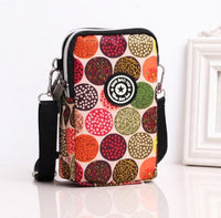 HKM-470931 Vertical Oxford Phone Bag with Zipper Closure and Multiple Floral Prints