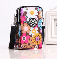 HKM-470931 Vertical Oxford Phone Bag with Zipper Closure and Multiple Floral Prints