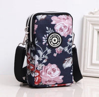 HKM-470931 Vertical Oxford Phone Bag with Zipper Closure and Multiple Floral Prints