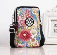 HKM-470931 Vertical Oxford Phone Bag with Zipper Closure and Multiple Floral Prints
