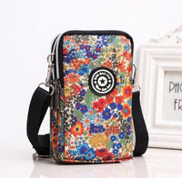 HKM-470931 Vertical Oxford Phone Bag with Zipper Closure and Multiple Floral Prints