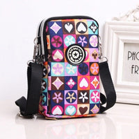 HKM-470931 Vertical Oxford Phone Bag with Zipper Closure and Multiple Floral Prints