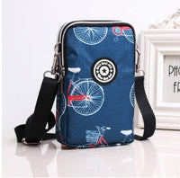 HKM-470931 Vertical Oxford Phone Bag with Zipper Closure and Multiple Floral Prints