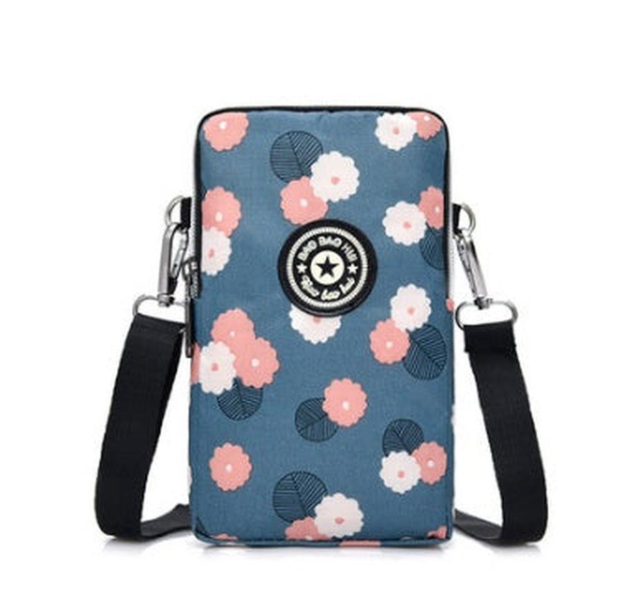 HKM-470931 Vertical Oxford Phone Bag with Zipper Closure and Multiple Floral Prints
