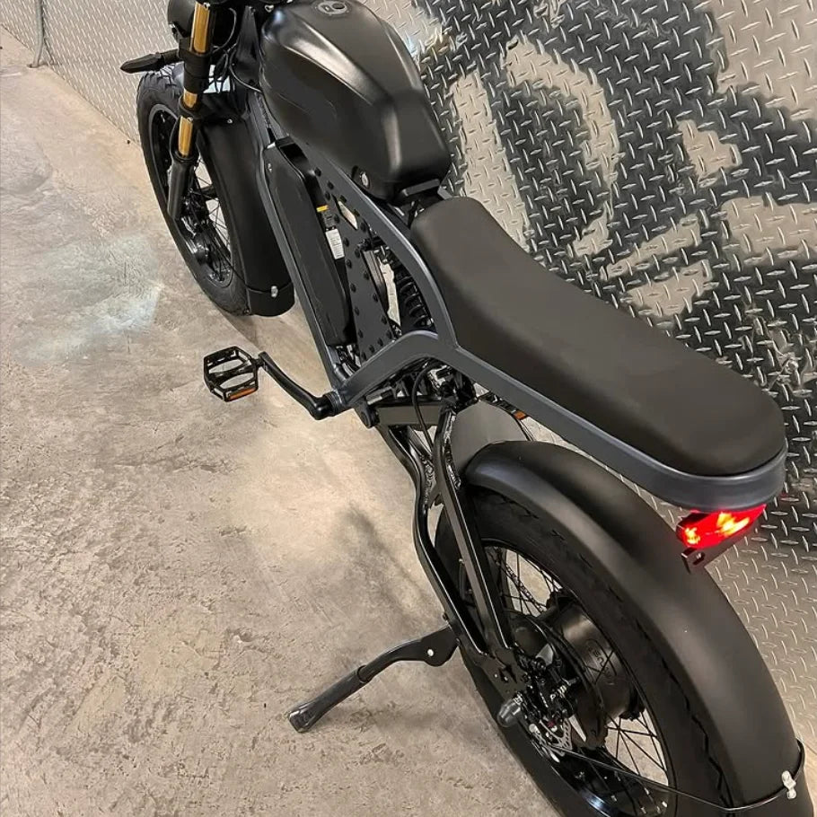 HKM-484115 1500W Electric Mountain Bike with 100KM Range, Full Suspension, 7-Speed Gears, and Fat Tires