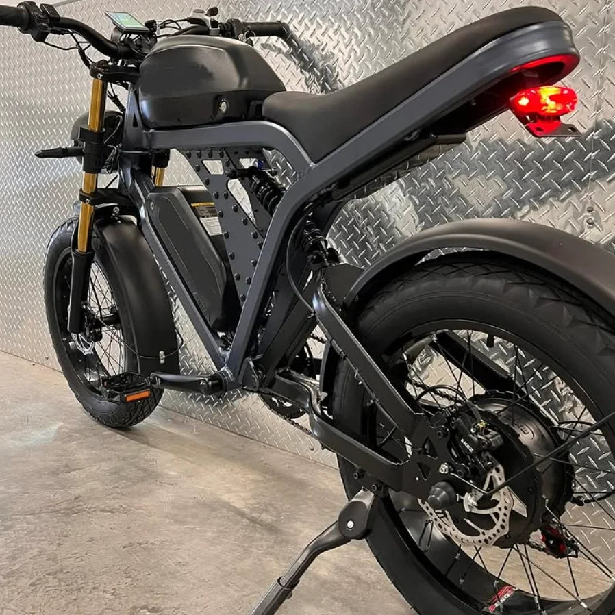 HKM-484115 1500W Electric Mountain Bike with 100KM Range, Full Suspension, 7-Speed Gears, and Fat Tires