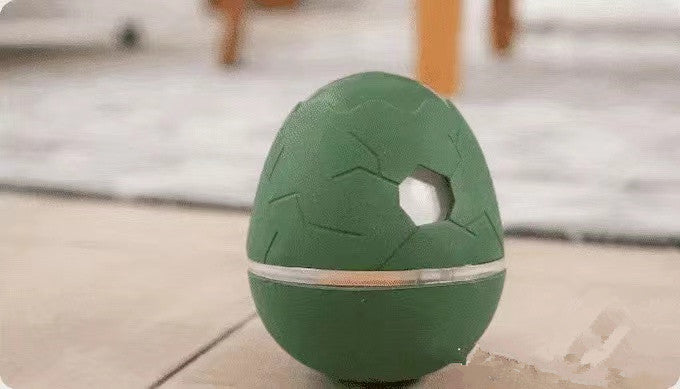 HKM-5254461 Egg Shaped Dancing Toy for Pets - Interactive Snack Dispenser with Whistle, Light and Motion