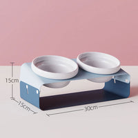 HKM-5259581 Ceramic Anti-Spill Double Bowl with Slanting Design and Iron Stand