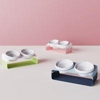 HKM-5259581 Ceramic Anti-Spill Double Bowl with Slanting Design and Iron Stand