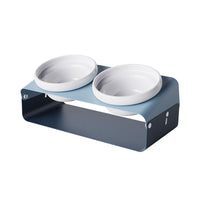 HKM-5259581 Ceramic Anti-Spill Double Bowl with Slanting Design and Iron Stand