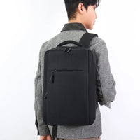 HKM-569427 Stylish Lightweight Laptop Backpack with USB Charging Port and Mezzanine Design for Outdoor and Business Use