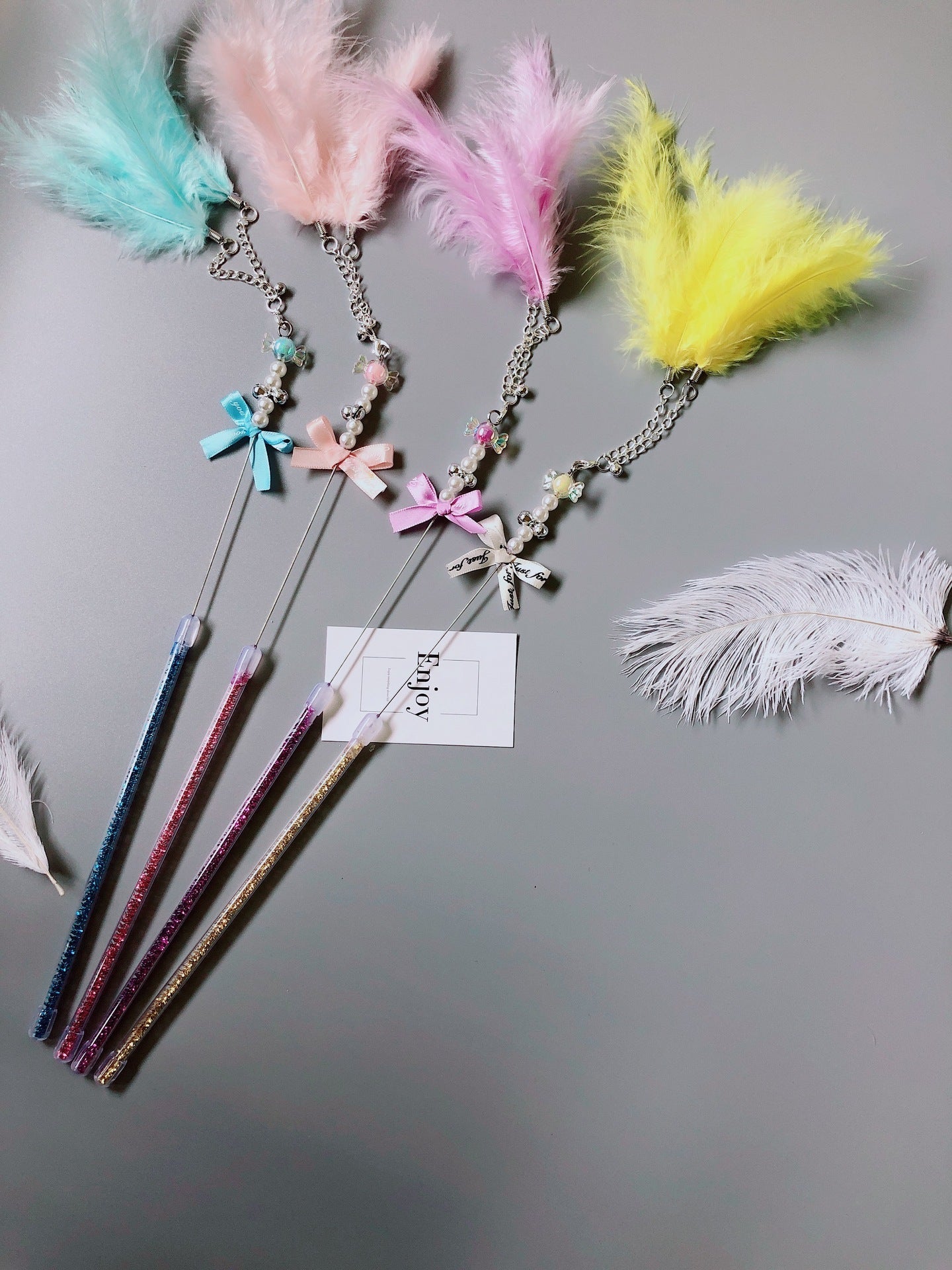 HKM-5699133 Handmade Cowhide Cat Stick Toy in Blue, Pink, Purple, and Yellow