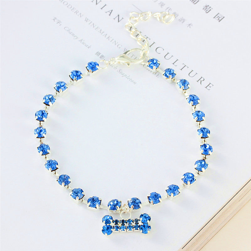 HKM-6322109 Rhinestone Bone Pendant Necklace in White, Pink, Blue, and Red - Unisex Princess Style