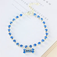 HKM-6322109 Rhinestone Bone Pendant Necklace in White, Pink, Blue, and Red - Unisex Princess Style