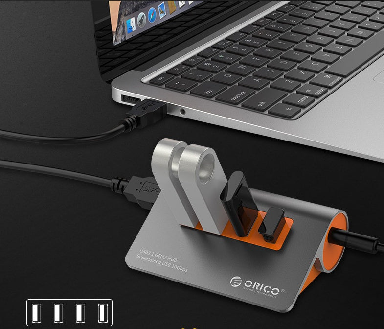 HKM-645779 Aluminum Alloy Laptop Hub with 4 USB 3.1 Ports and Power Supply in Dark Gray and Orange