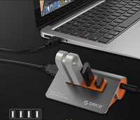 HKM-645779 Aluminum Alloy Laptop Hub with 4 USB 3.1 Ports and Power Supply in Dark Gray and Orange