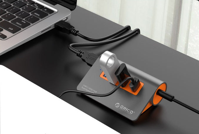 HKM-645779 Aluminum Alloy Laptop Hub with 4 USB 3.1 Ports and Power Supply in Dark Gray and Orange