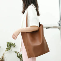 HKM-693587 Leisure Lychee Grain Drawstring Bucket Bag - Large Capacity PU Leather Shoulder Bag