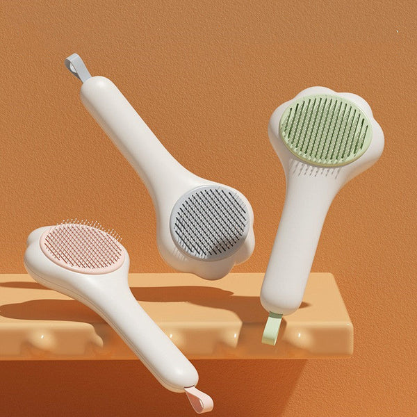 HKM-6986173 Self-Cleaning Pet Comb for Cats and Dogs ¨C Durable ABS with Stainless Steel Teeth in Pink, Blue, and Green