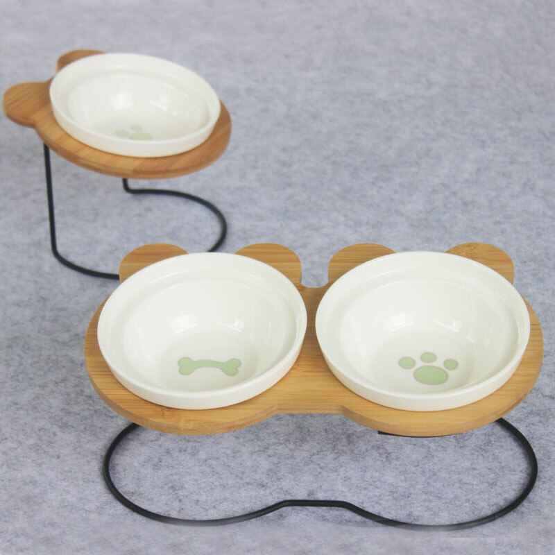 HKM-6986557 Slanted Pet Bowl with Bamboo Stand in Fish Bones and Paws Design
