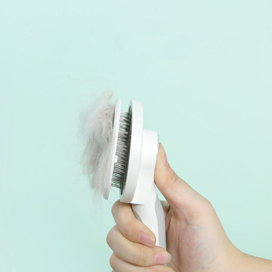 HKM-6997693 Round Handle Self-Cleaning Pet Comb with Stainless Steel Needles and Sticky Bead Design