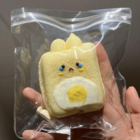 HKM-7029693 Silicone Rabbit Rice Cake Squeezing Toy in Chocolate and Poached Egg Colors