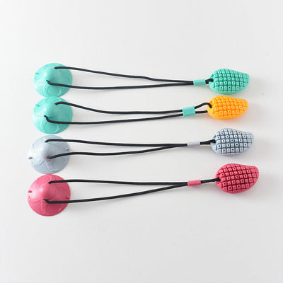 HKM-7453501 Multipurpose Mango Molar Rod for Dogs - Sucker Drawstring Pet Toy in Green, Gray, Red, and Yellow