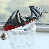 HKM-7474109 Little Devil Wings Bell Leather Choker in Patent Satin