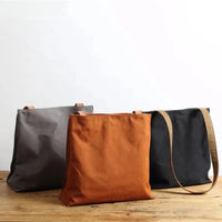 HKM-824659 Durable Leather and Canvas Crossbody Bag with Adjustable Shoulder Strap, Retro Design