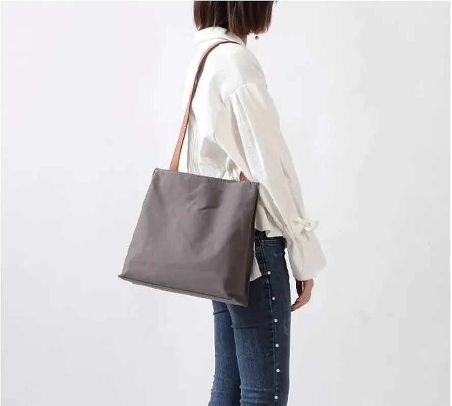 HKM-824659 Durable Leather and Canvas Crossbody Bag with Adjustable Shoulder Strap, Retro Design