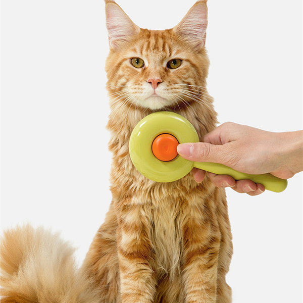 HKM-8564797 Doughnut-Shaped Cat De-shedding Comb with Fine Needle Design in Green, White, and Pink