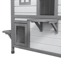 HKM-8771389 2-Story Weatherproof Wooden Cat House with Escape Door and Climbing Ledges - White