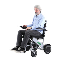 HKM-911571 Aluminum Alloy Folding Electric Wheelchair with 120kg Capacity and 20km Range