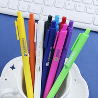 HKM-929939 Custom Logo Printed Retractable Ballpoint Pen with Soft Rubber Grip in Multiple Colours