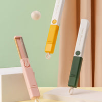 HKM-102611 Electrostatic Carry Clothes Hair Removal Brush - Compact Design in Yellow, Green, and Pink